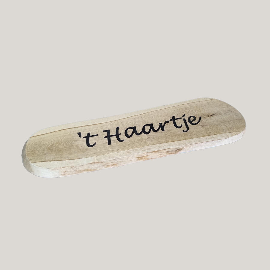Naambord huis op gevel